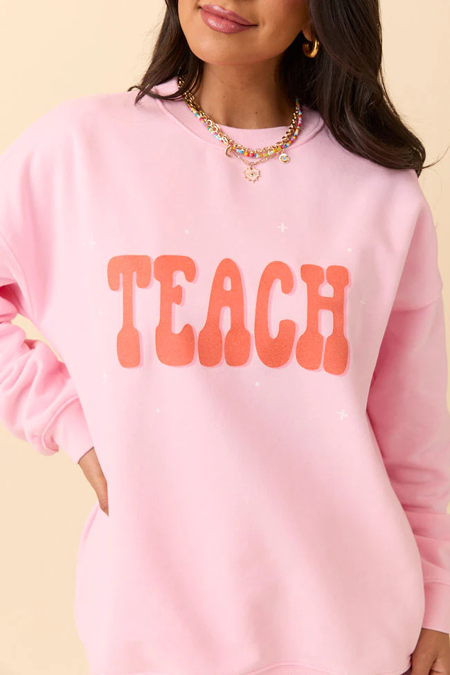 Teach Light Pink Graphic Sweatshirt DOORBUSTER - Terpint